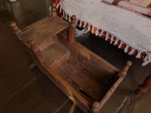 Wooden cradle in Dwight Derby House