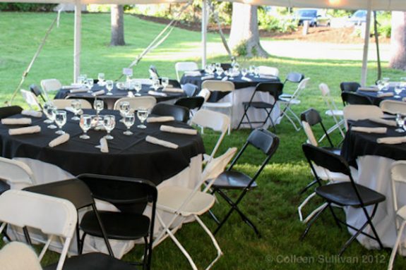 Tables and chairs on lawn DDH Gala 2012